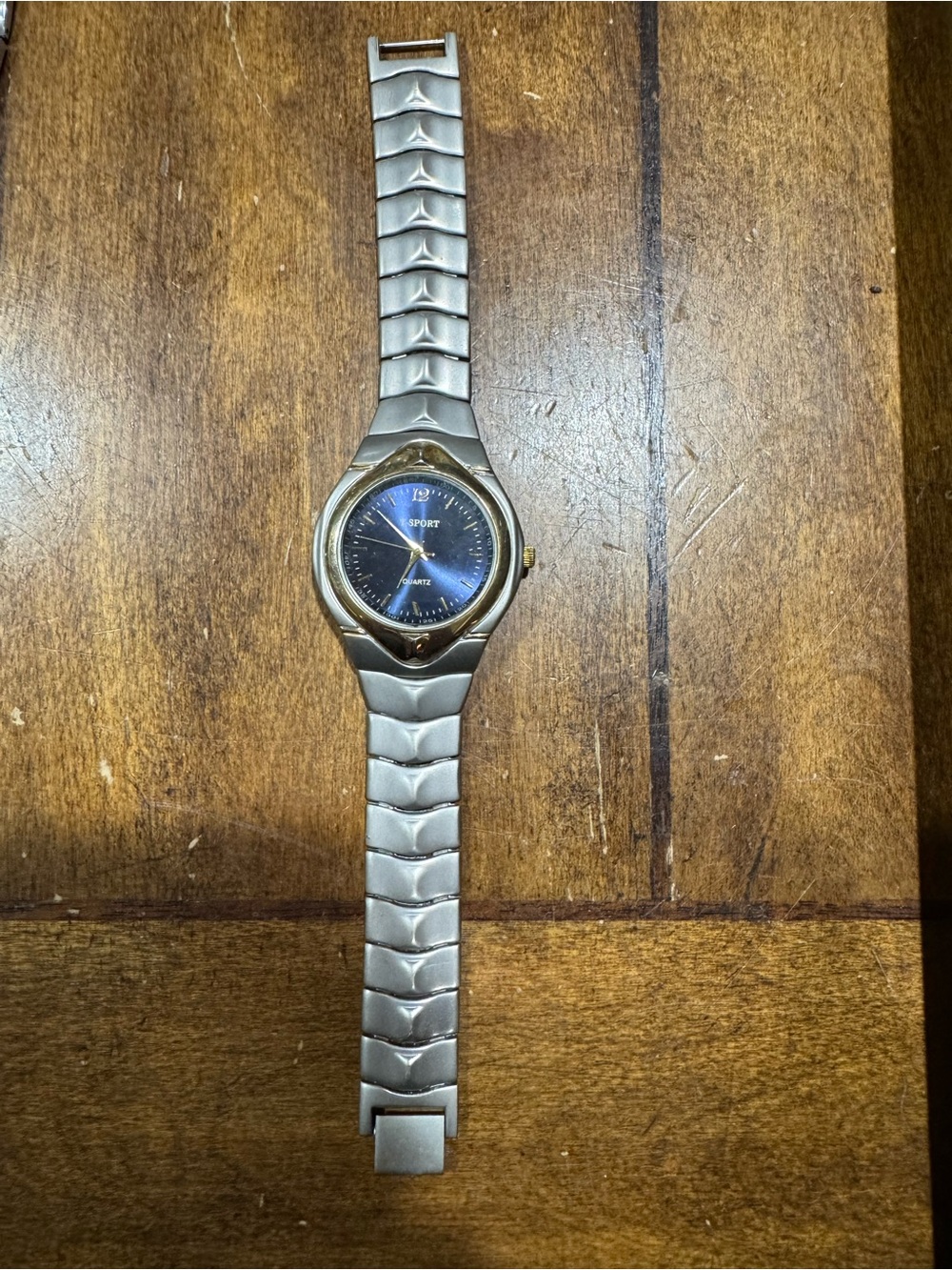T-Spot Quartz Men's Silver Bracelet Watch with Blue Dial and Gold Accent